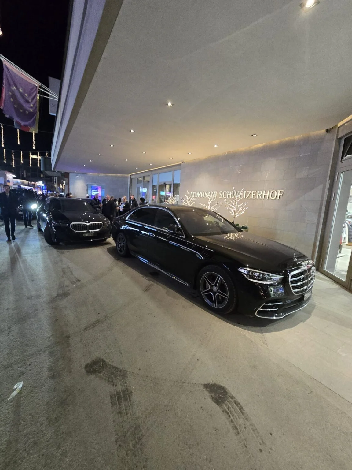 Mercedes S-Class of Davos Private Driver in front of a hotel in Davos